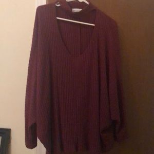 Maroon sweater with wide swoop cutout